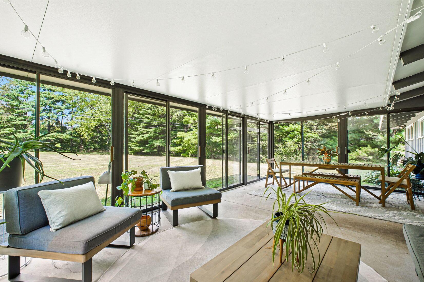 3216 Polley Road Columbus, OH 43221 - Photo 34 of 45 Comfortable lounge area wrapped in windows and natural light.