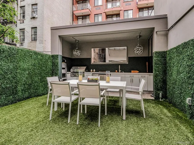 a bathroom with a sink a mirror and vanity
