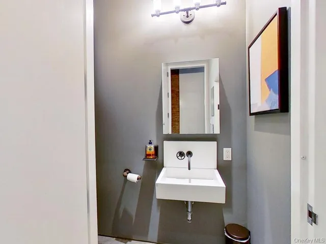 a living room with fireplace furniture and a flat screen tv