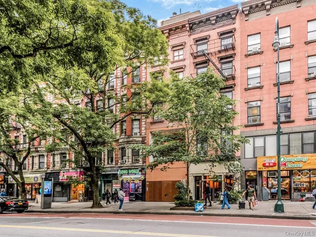 a view of a building and a street