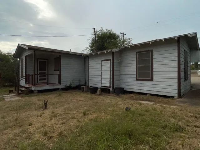 a view of a house with a garage