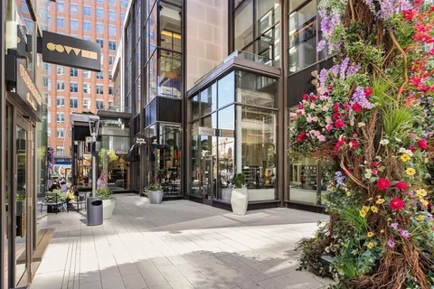 a view of street with sitting area