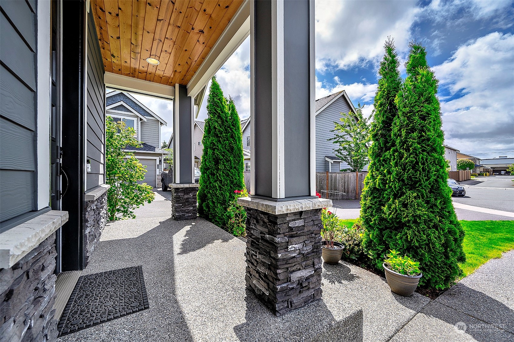 4015 147th Place Southeast Bothell, WA 98012 - Photo 4 of 31 a view of a house with potted plants