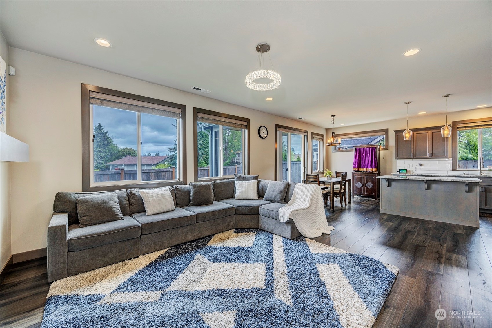 4015 147th Place Southeast Bothell, WA 98012 - Photo 9 of 31 a living room with furniture and a large window