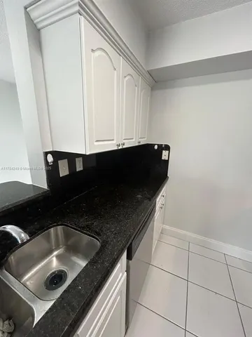 a view of a livingroom with a staircase