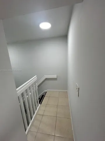 an empty room with a bathroom