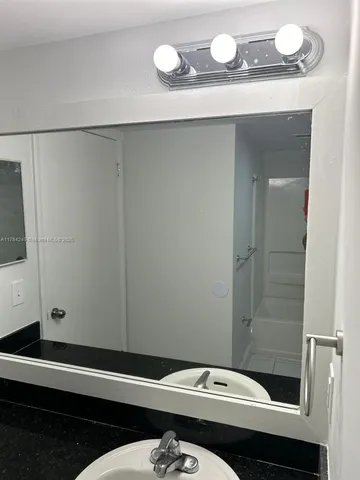 a view of an empty room with stairs