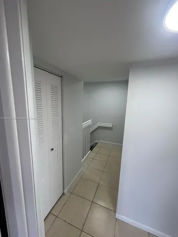 a bathroom with a sink toilet a mirror and shower