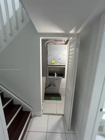 a view of a storage & utility room in a house