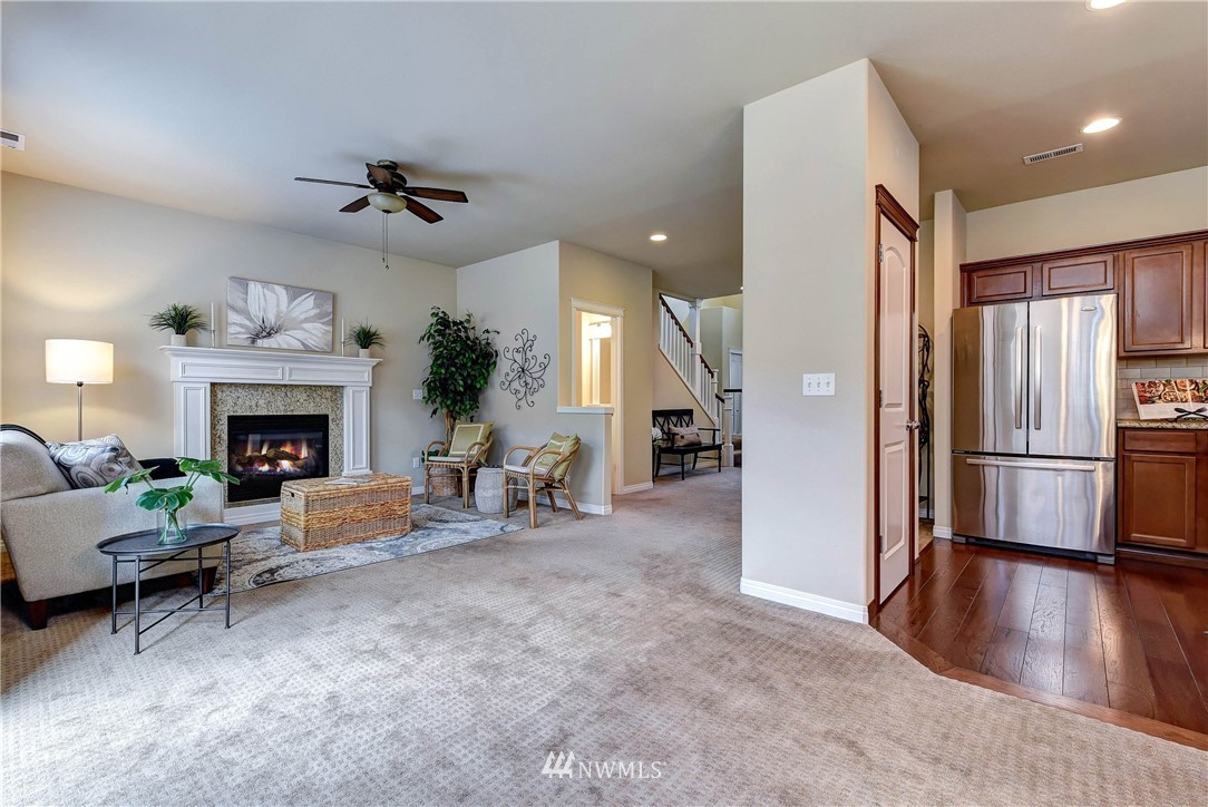16220 2nd Avenue Southeast Bothell, WA 98012 - Photo 14 of 40 a living room with furniture and a fireplace