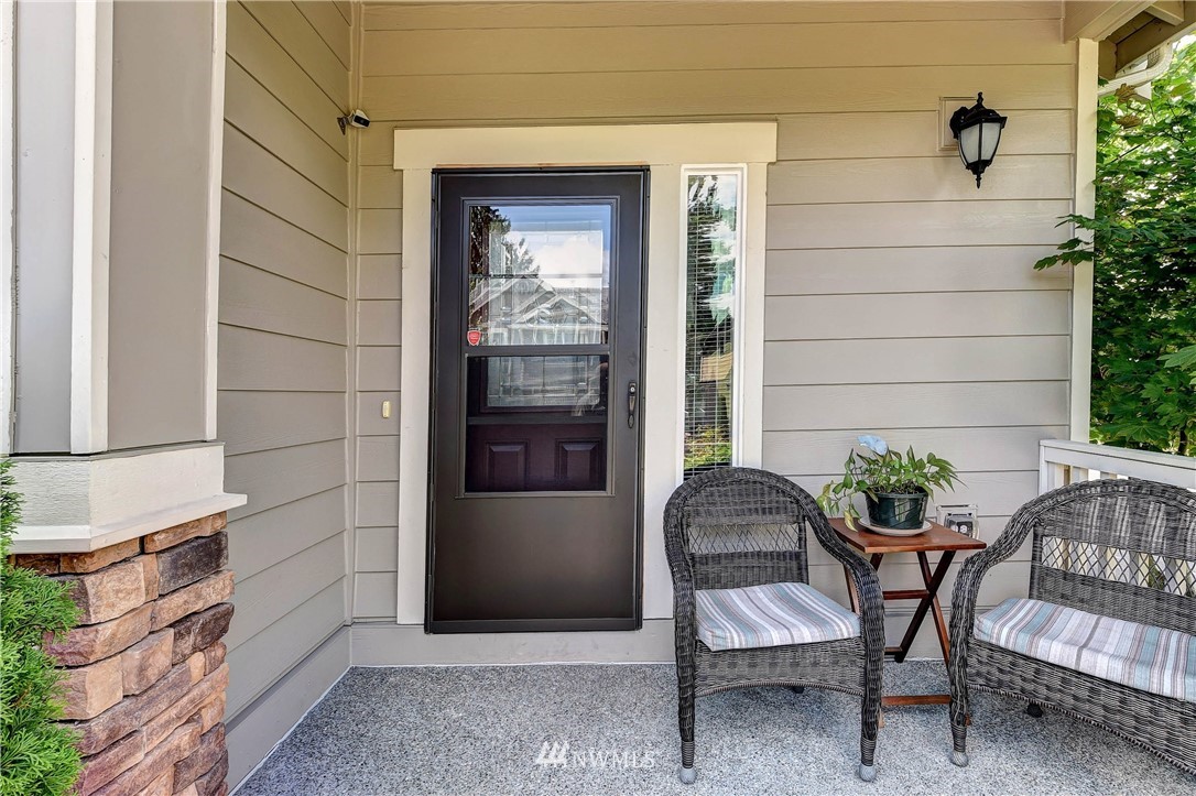 16220 2nd Avenue Southeast Bothell, WA 98012 - Photo 5 of 40 a view of a chair and table in the patio