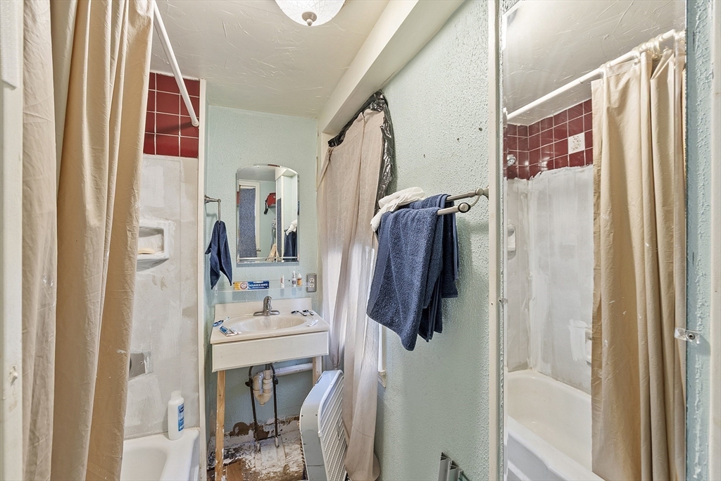 2 Kosta Avenue Rutland, MA 01543 - Photo 12 of 34 a bathroom with a bathtub and a shower