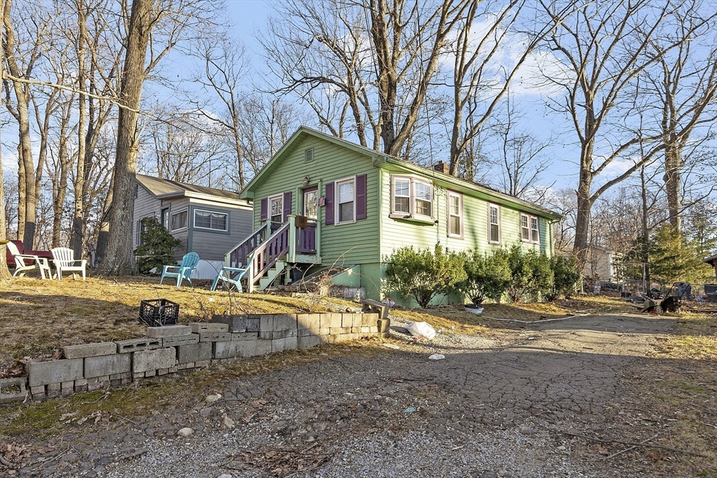2 Kosta Avenue Rutland, MA 01543 - Photo 30 of 34 a view of a house with a yard and trees