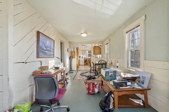 a room with furniture and a window