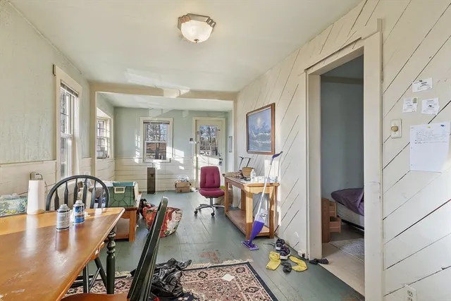 a living room with furniture and a table