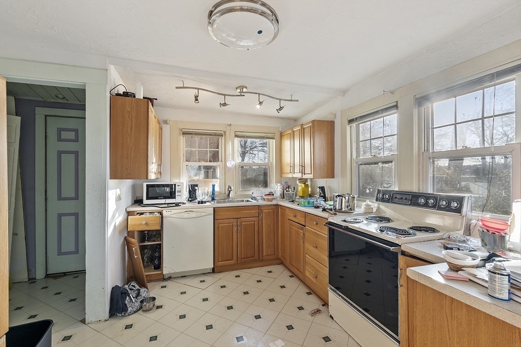 2 Kosta Avenue Rutland, MA 01543 - Photo 8 of 34 a kitchen with a sink stove and cabinets