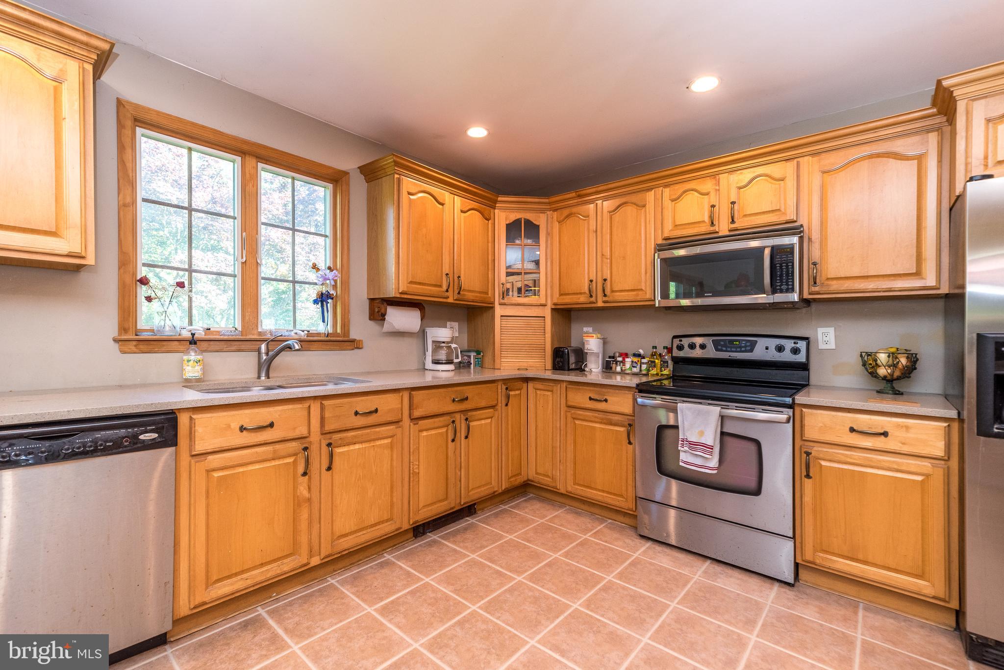 511 Upper Stump Road Chalfont, PA 18914 - Photo 16 of 37 Huge kitchen with tons of natural wood cabinets