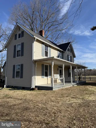 a front view of a house with a garage