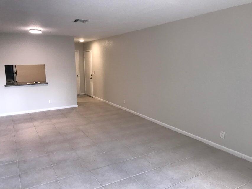 240 Croton Avenue, Unit 204 Lantana, FL 33462 - Photo 4 of 10 Kitchen pass thru