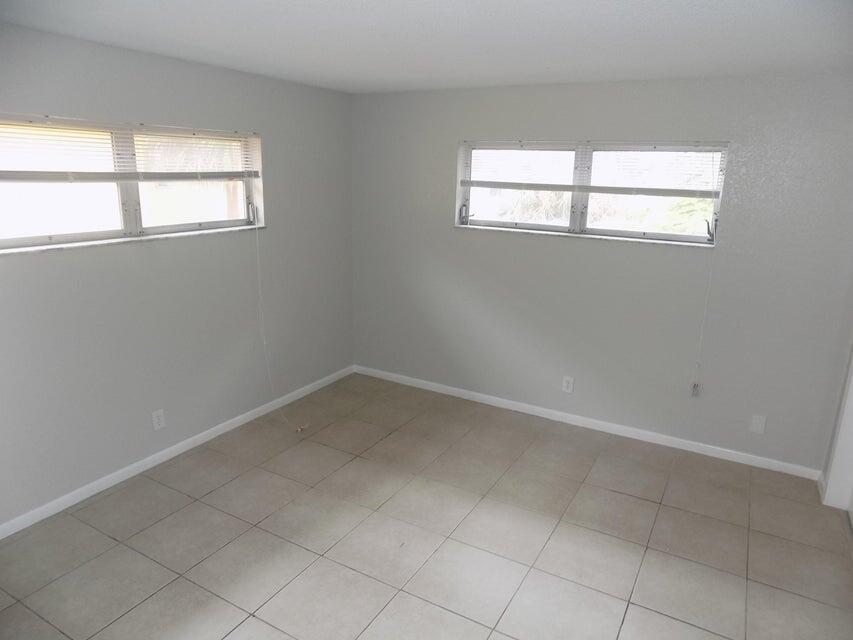 240 Croton Avenue, Unit 204 Lantana, FL 33462 - Photo 9 of 10 front bedroom