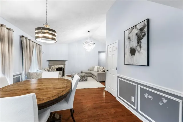 a bedroom with a bed and ceiling fan