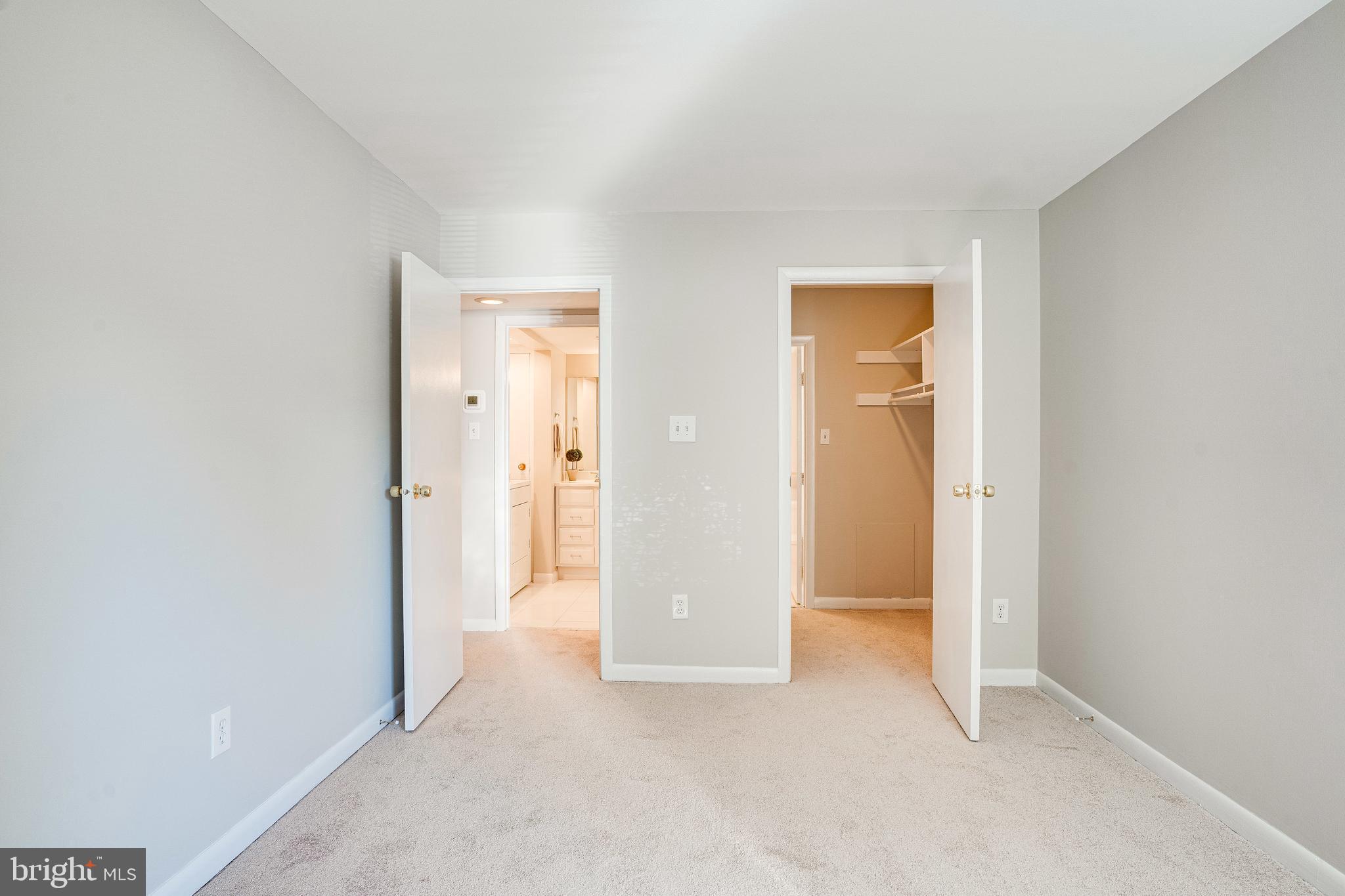 5765 Rexford Court, Unit 5765I Springfield, VA 22152 - Photo 24 of 57 Primary Bedroom with Large Walk-In Closet