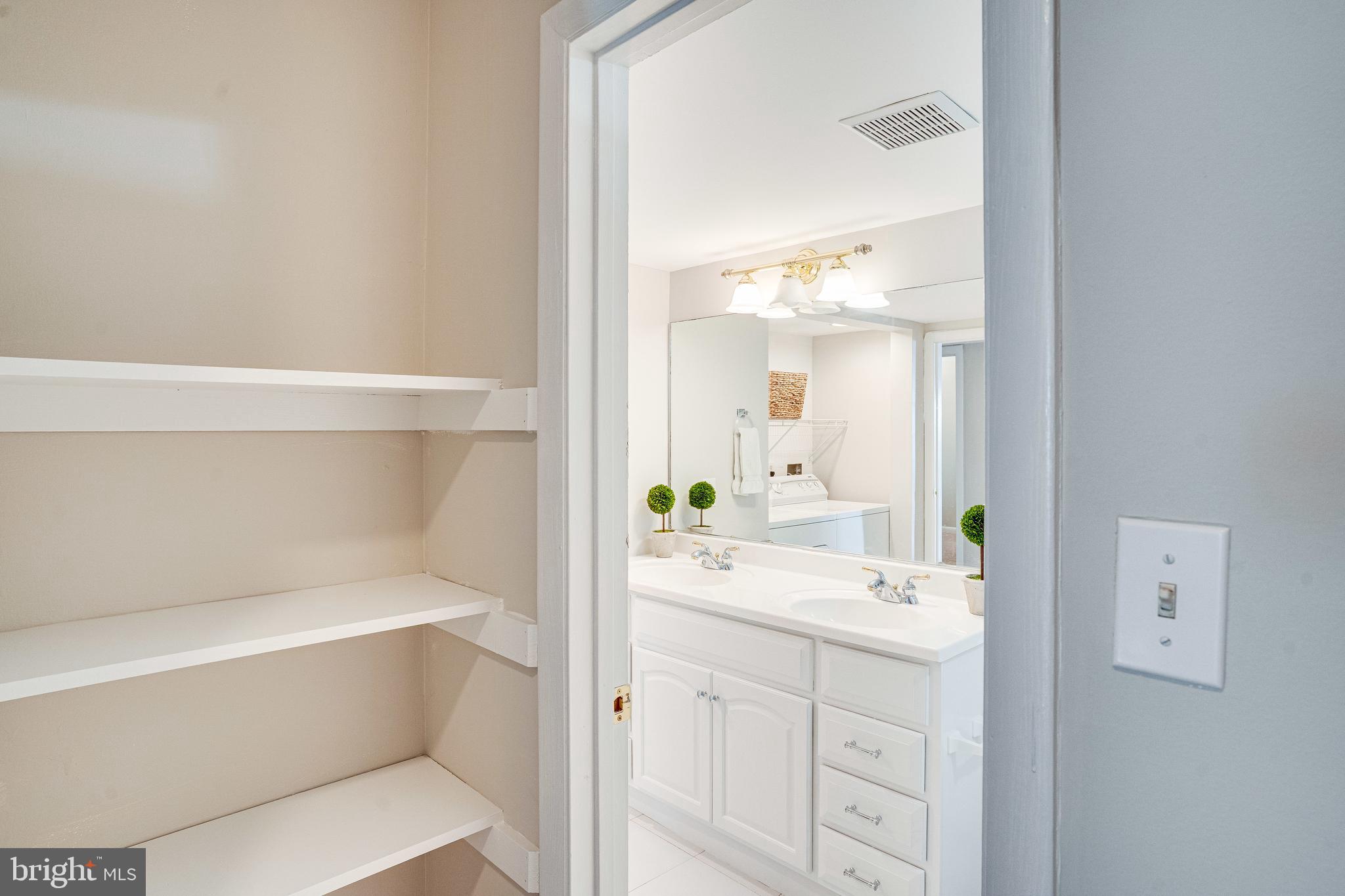 5765 Rexford Court, Unit 5765I Springfield, VA 22152 - Photo 26 of 57 Primary Bedroom Walk-In Closet