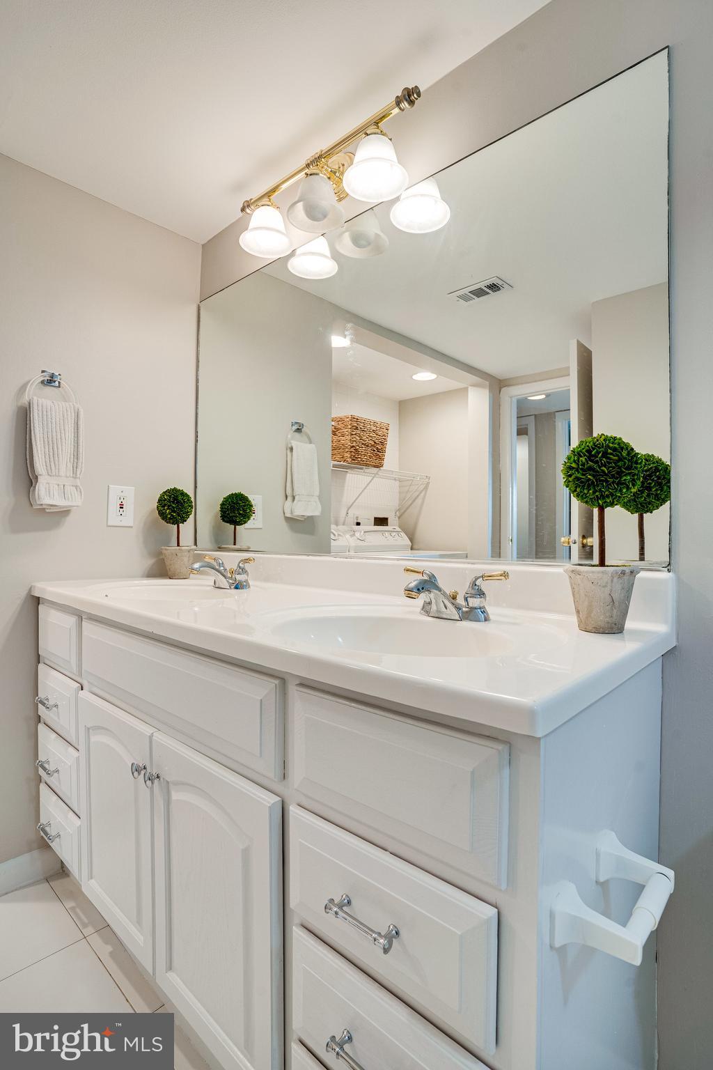 5765 Rexford Court, Unit 5765I Springfield, VA 22152 - Photo 33 of 57 Updated Bathroom with Double Sink Vanity