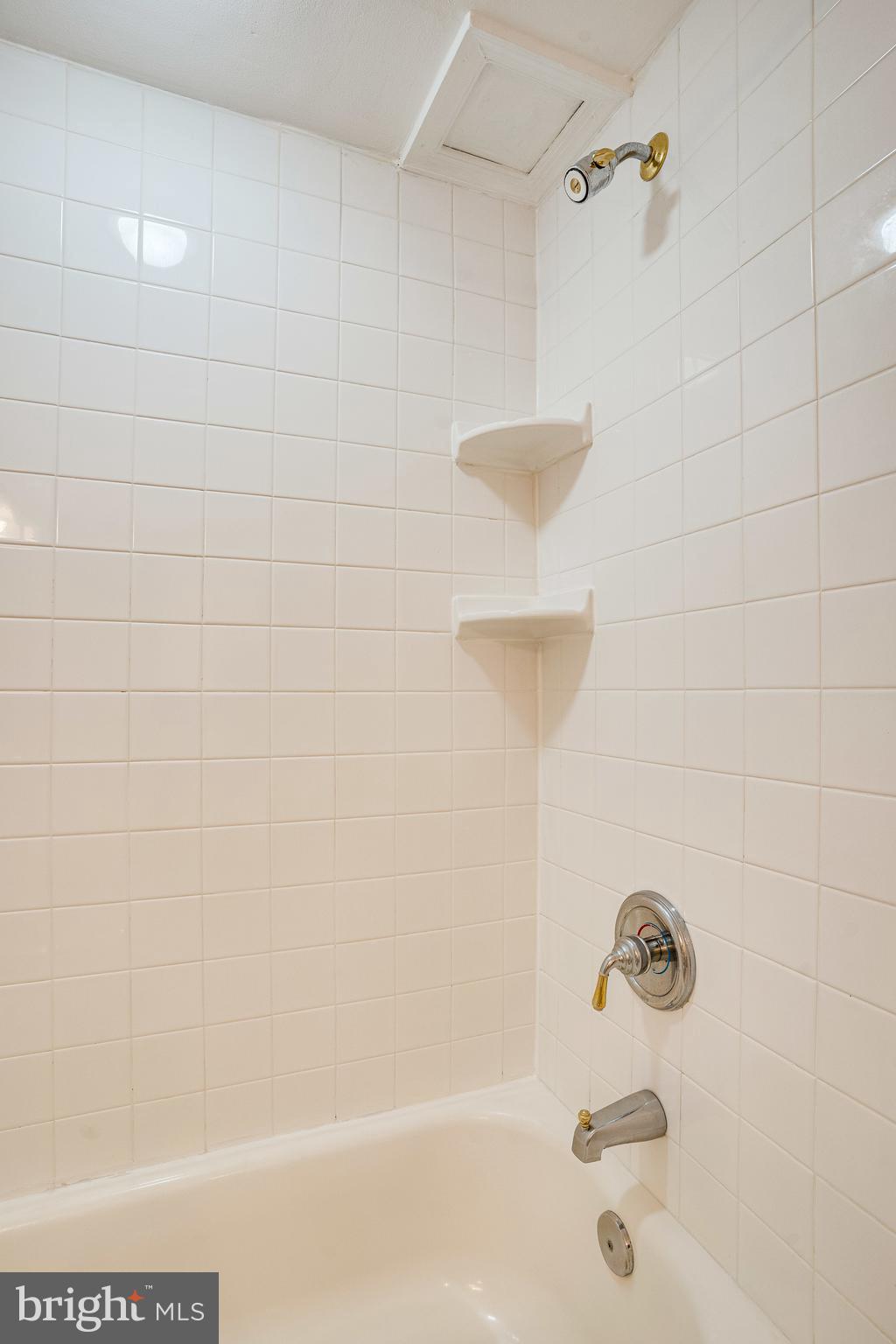5765 Rexford Court, Unit 5765I Springfield, VA 22152 - Photo 35 of 57 Bathroom with Tub Shower