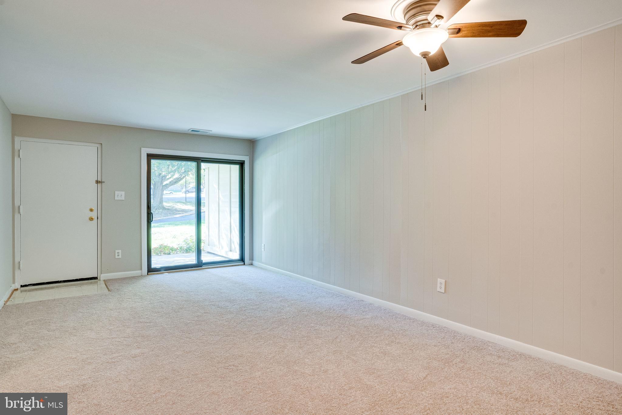 5765 Rexford Court, Unit 5765I Springfield, VA 22152 - Photo 10 of 57 Freshly Painted Living Room/Dining Area
