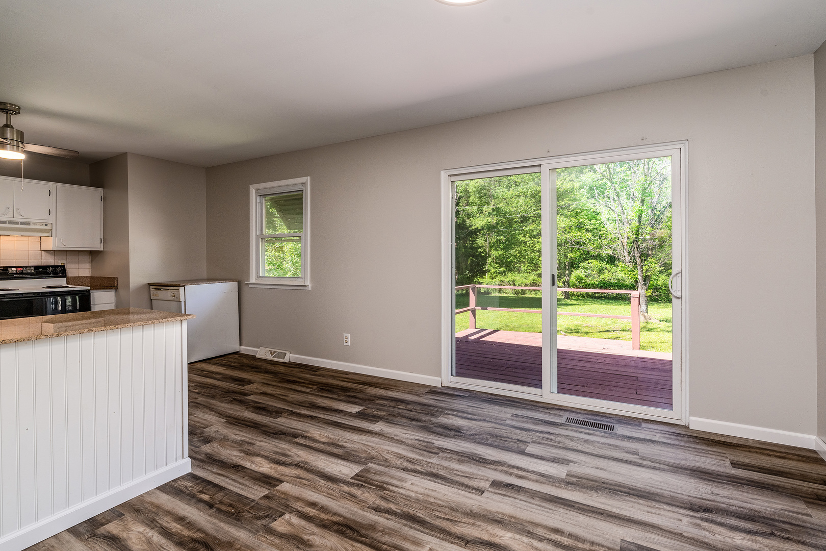 1307 North 16th Street Murphysboro, IL 62966 - Photo 11 of 27 a view of a kitchen with wooden floor and a window