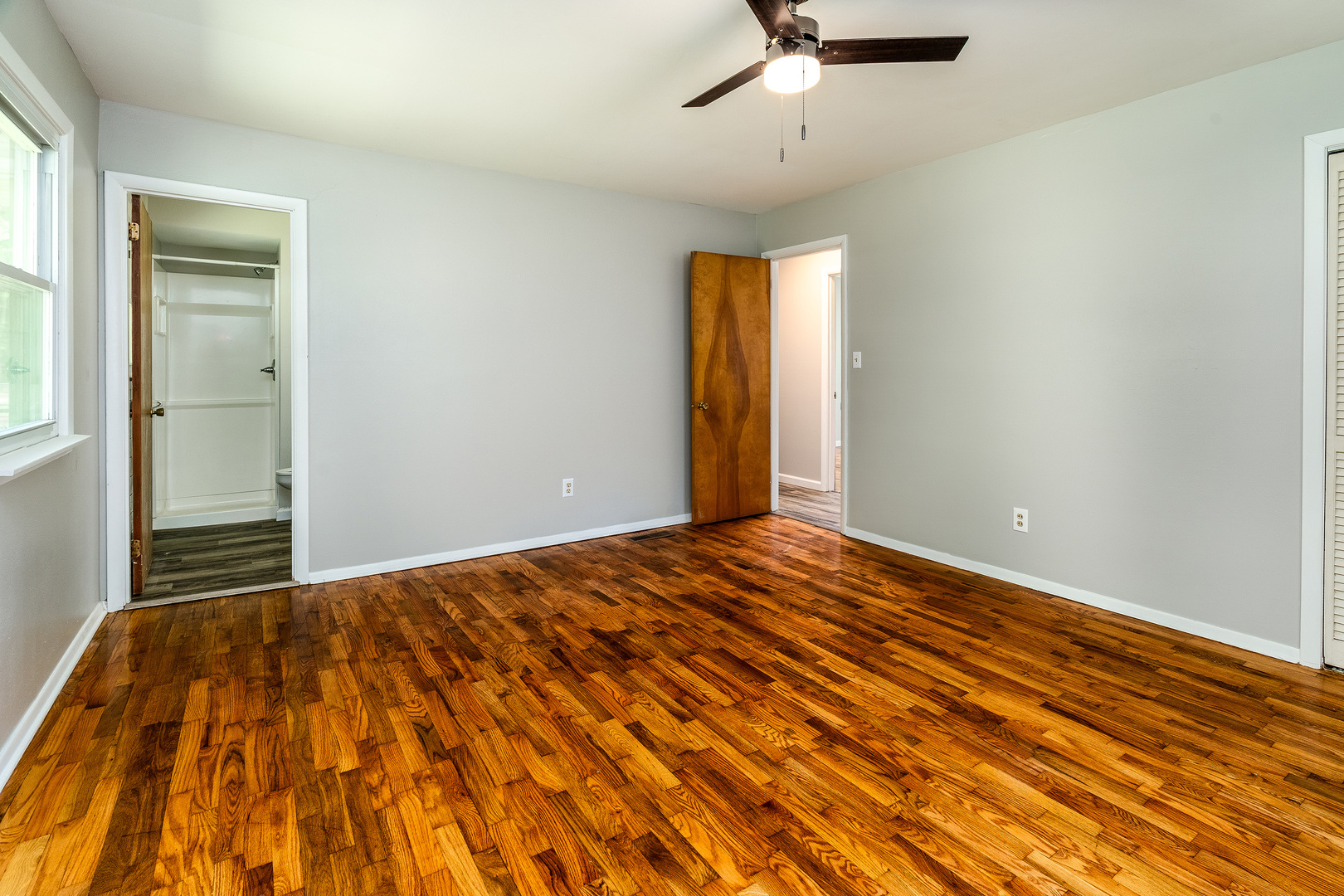 1307 North 16th Street Murphysboro, IL 62966 - Photo 14 of 27 a bedroom with a bed and a window
