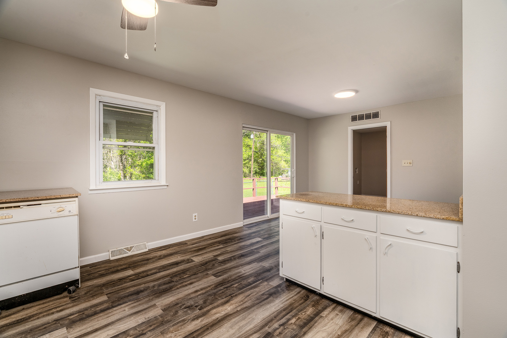 1307 North 16th Street Murphysboro, IL 62966 - Photo 7 of 27 wooden floor in an empty room with a window