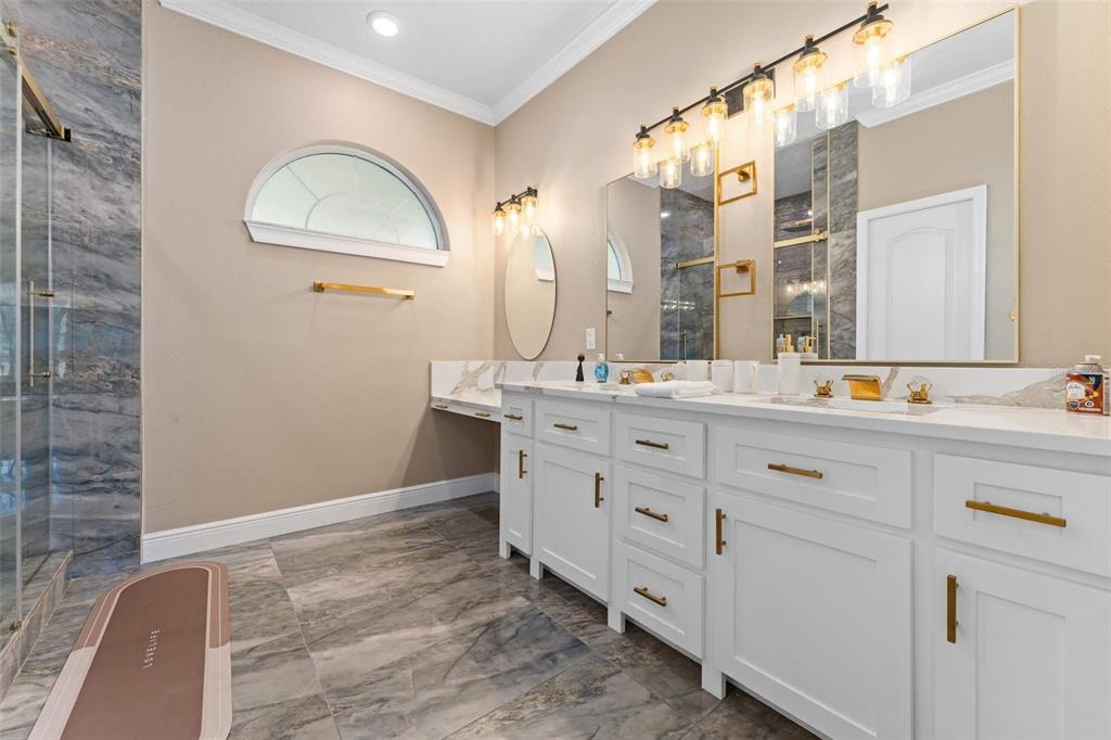 2832 Rodeo Drive Kissimmee, FL 34746 - Photo 25 of 46 a bathroom with a double vanity sink mirror and