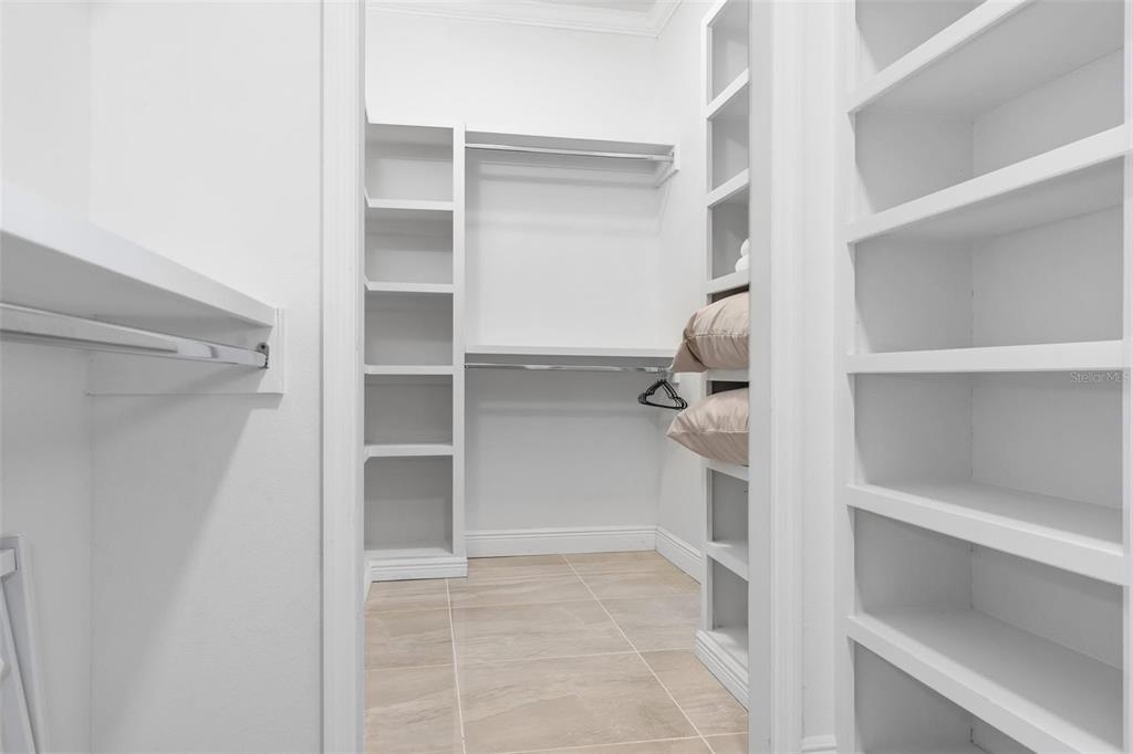 2832 Rodeo Drive Kissimmee, FL 34746 - Photo 27 of 46 a view of walk in closet with empty racks