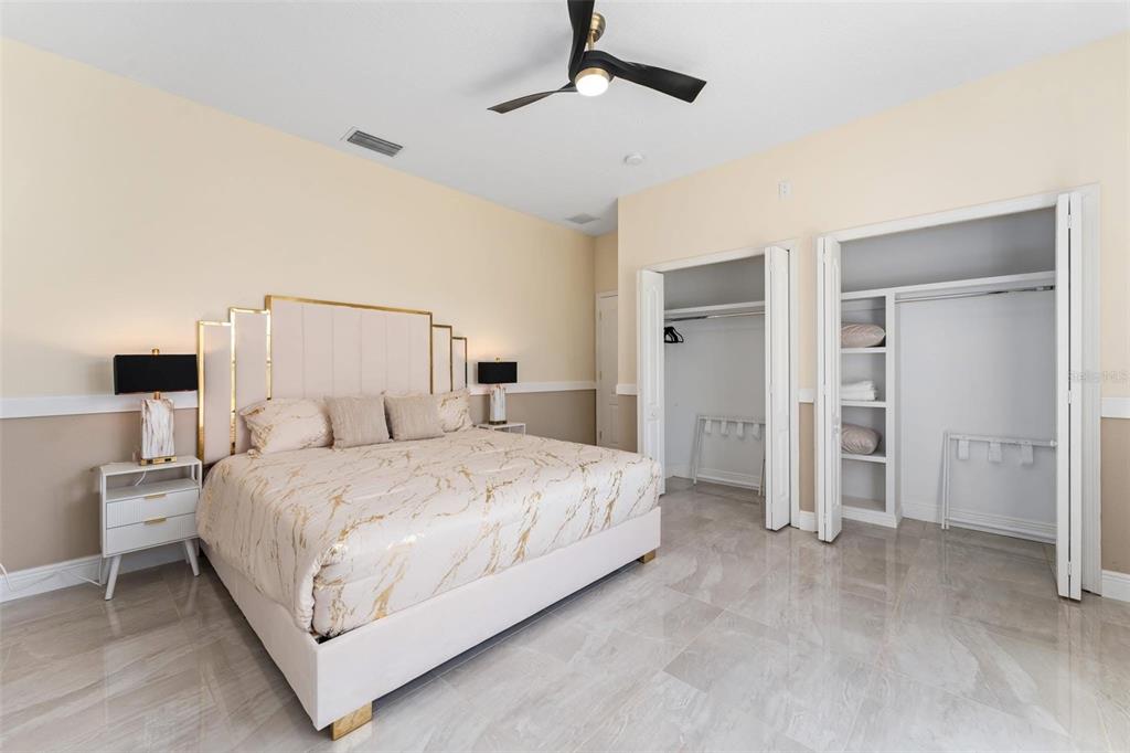 2832 Rodeo Drive Kissimmee, FL 34746 - Photo 32 of 46 a bedroom with a bed and closet