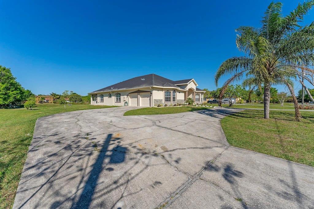 2832 Rodeo Drive Kissimmee, FL 34746 - Photo 4 of 46 a view of an house with outdoor space and lake view