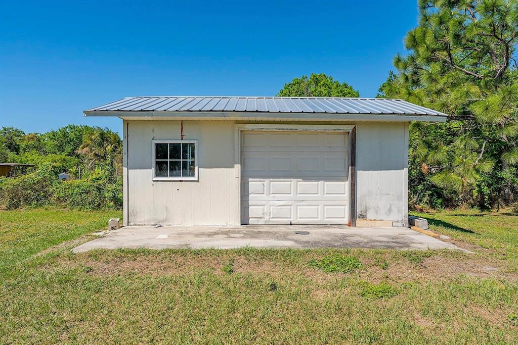 2832 Rodeo Drive Kissimmee, FL 34746 - Photo 41 of 46 a view of a house with a yard