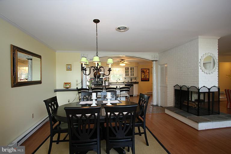 27864 Haley Road Easton, MD 21601 - Photo 13 of 29 Dining Room, wood burning fireplace