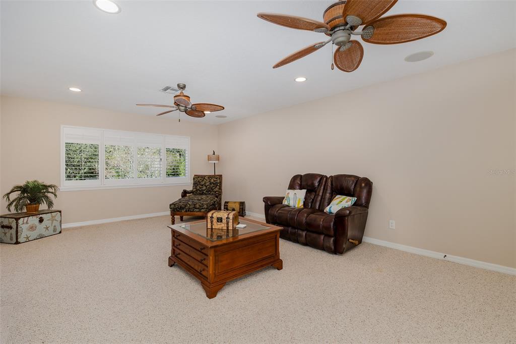 2928 Waters Edge Road Palm Harbor, FL 34685 - Photo 39 of 52 a living room with furniture