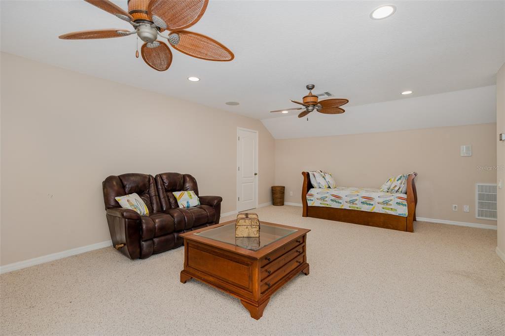 2928 Waters Edge Road Palm Harbor, FL 34685 - Photo 40 of 52 a living room with furniture