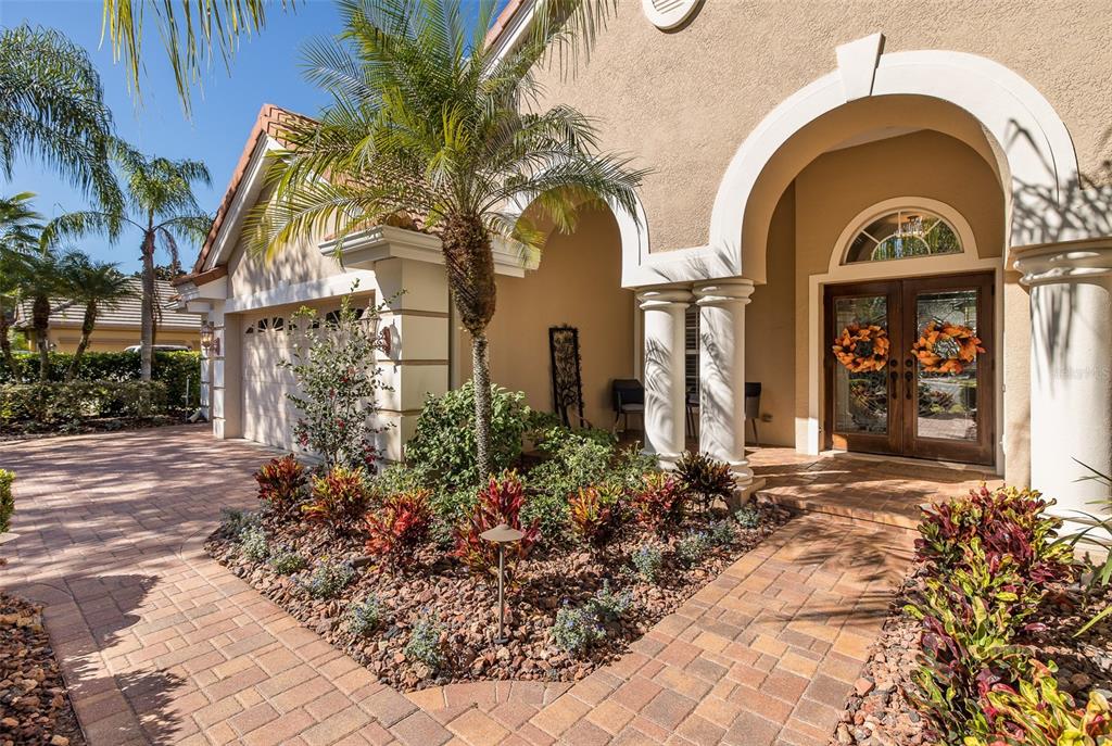 2928 Waters Edge Road Palm Harbor, FL 34685 - Photo 7 of 52 a view of entrance gate of house