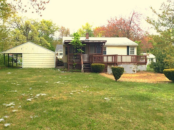 22 Inwood Road Rutland, MA 01543 - Photo 22 of 23 a view of a house with a yard and sitting area