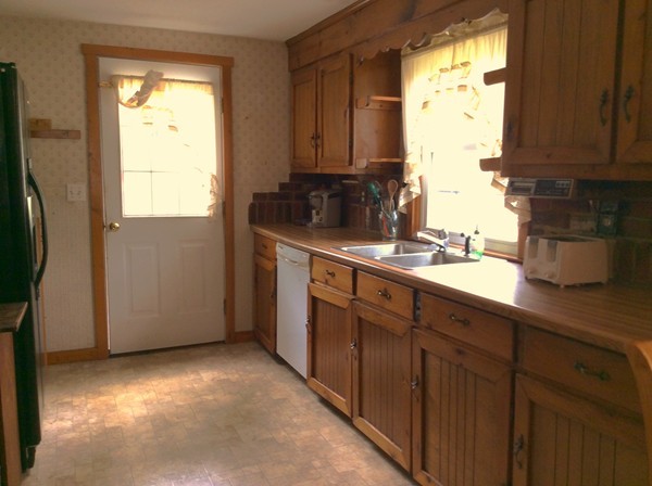 22 Inwood Road Rutland, MA 01543 - Photo 5 of 23 a kitchen with stainless steel appliances granite countertop a sink a refrigerator and a granite counter tops with a window