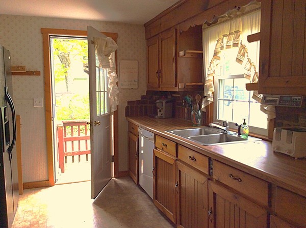 22 Inwood Road Rutland, MA 01543 - Photo 7 of 23 a kitchen with a sink a counter top space and cabinets