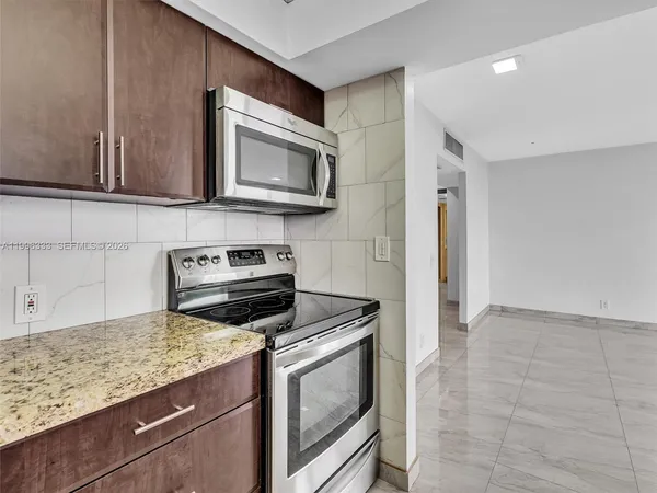 a view of a livingroom with a staircase