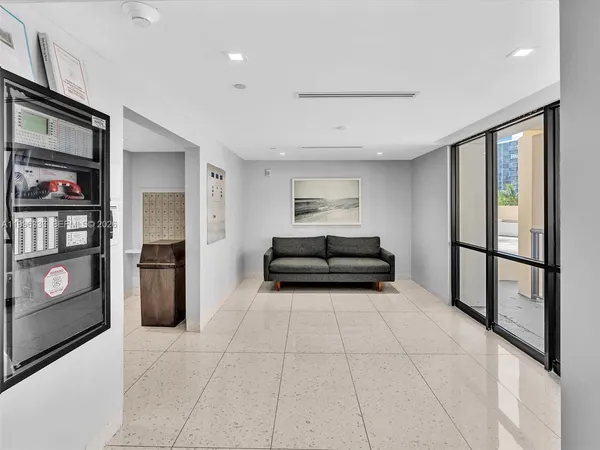 a view of a hallway with a couch