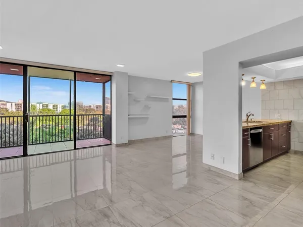 a view of a electric room and an empty room