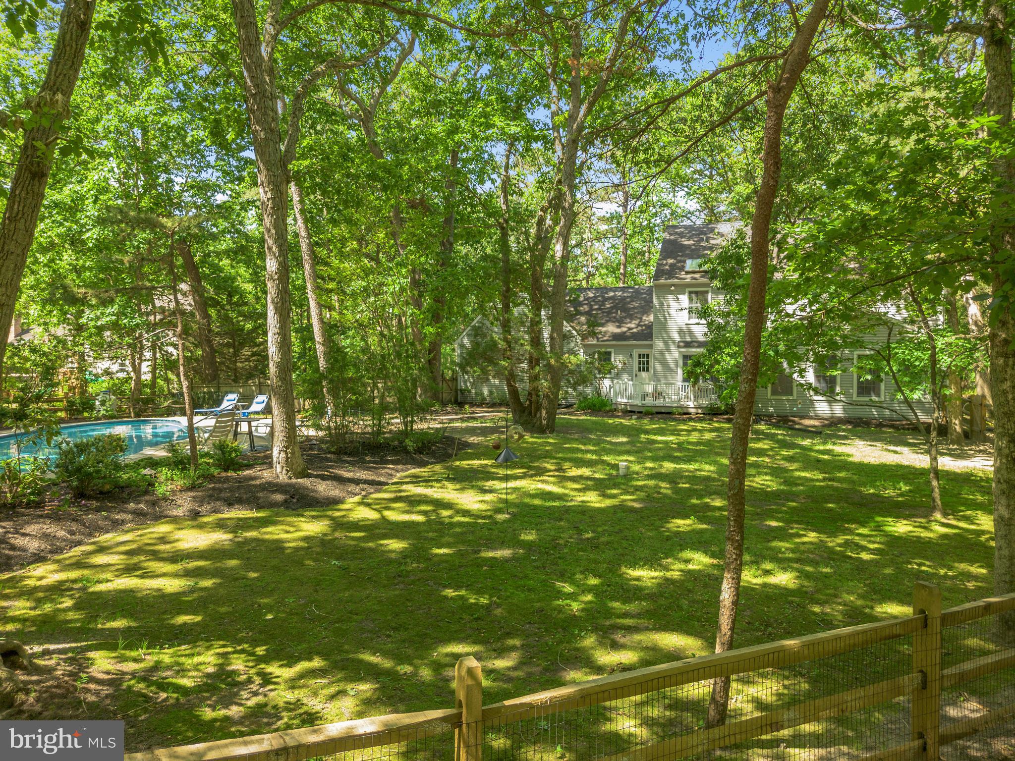 581 McKendimen Road Medford, NJ 08055 - Photo 7 of 34 a view of a yard with a tree