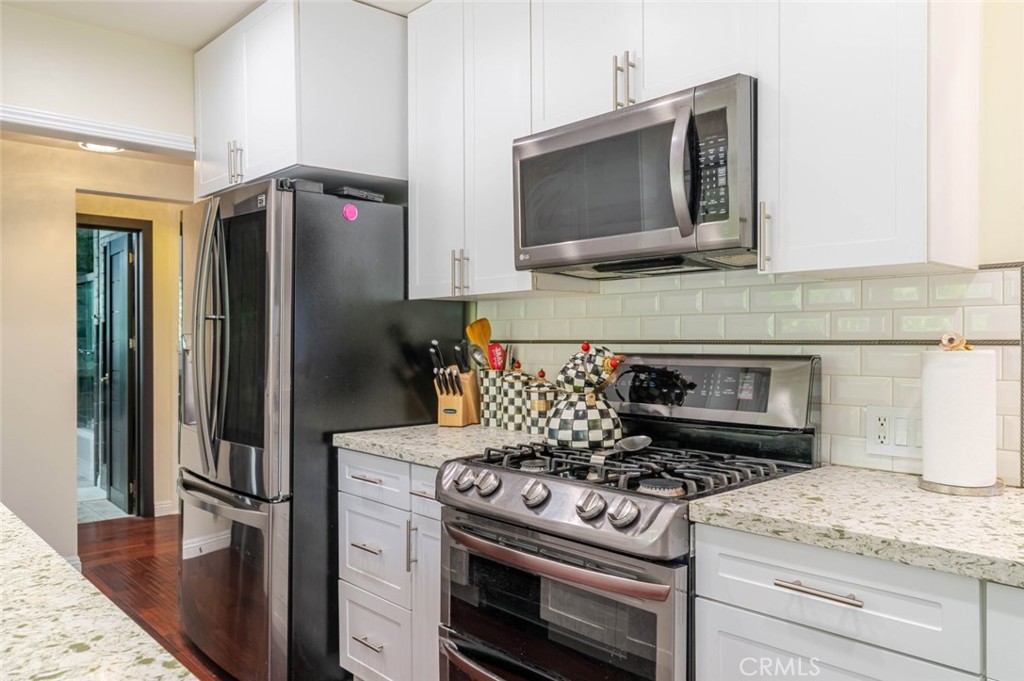 660 Woodbury Road Glendale, CA 91206 - Photo 11 of 45 a kitchen with a stove and a microwave